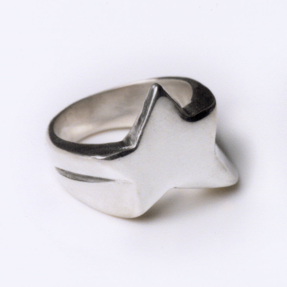 Silver ring on a white background