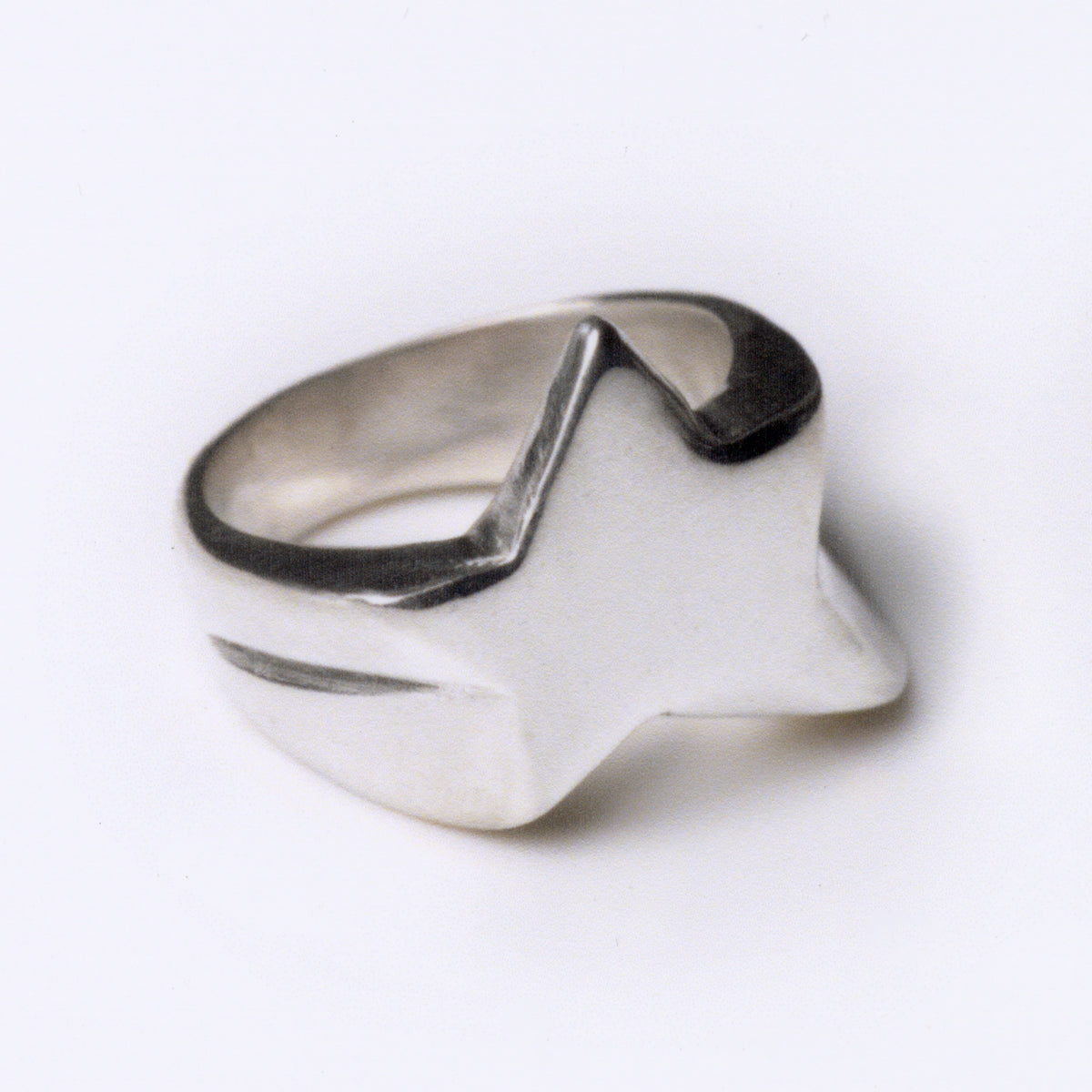 Silver ring on a white background